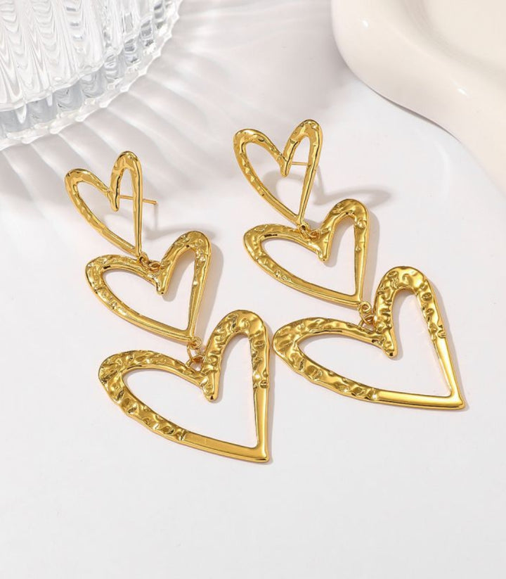 Aretes tassel corazones