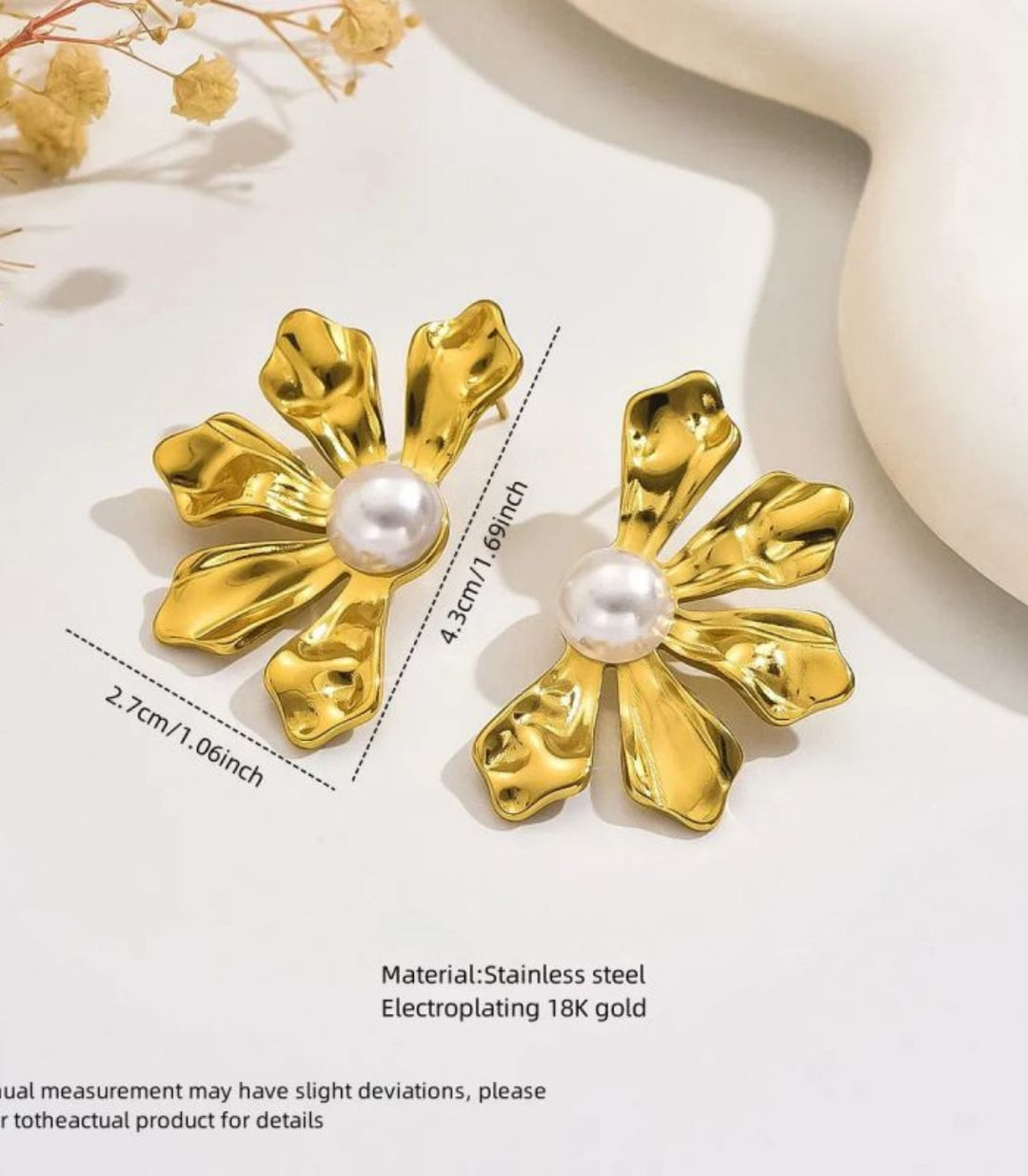 Aretes pétalos con perla