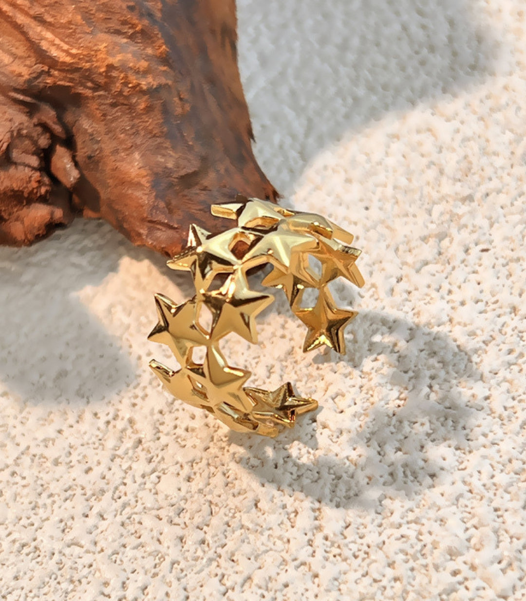 Anillo estrellas dorado