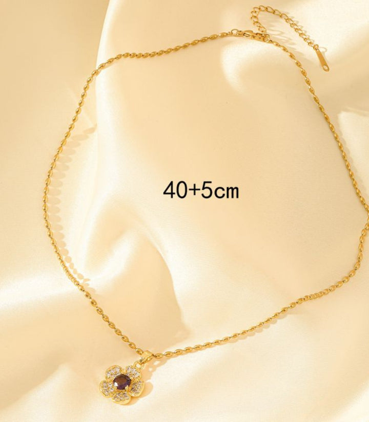 Collar Flor Morada 18K