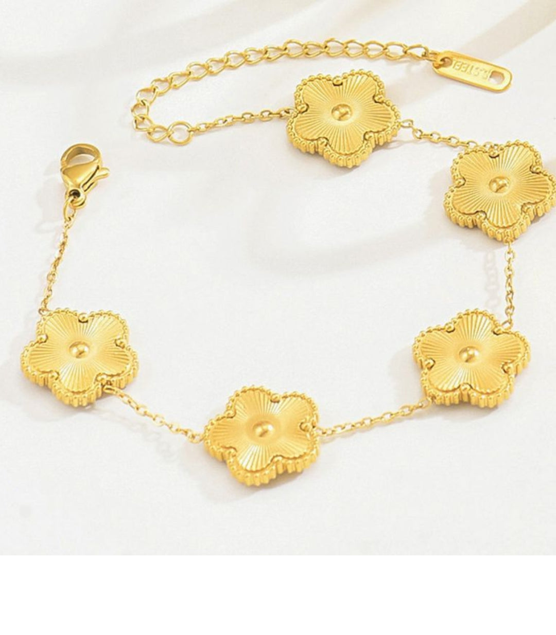 Brazalete flor dorado