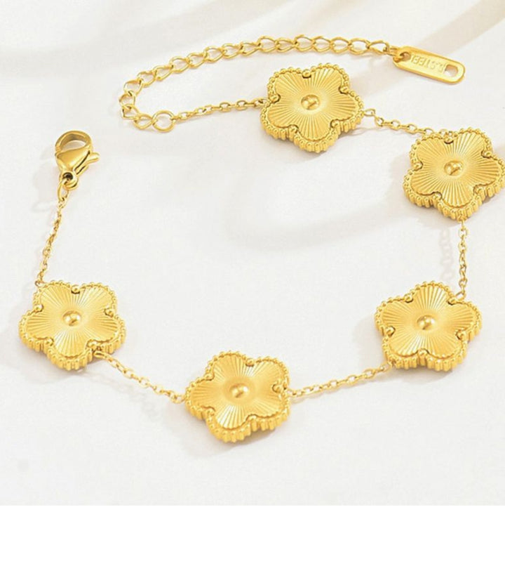 Brazalete flor dorado
