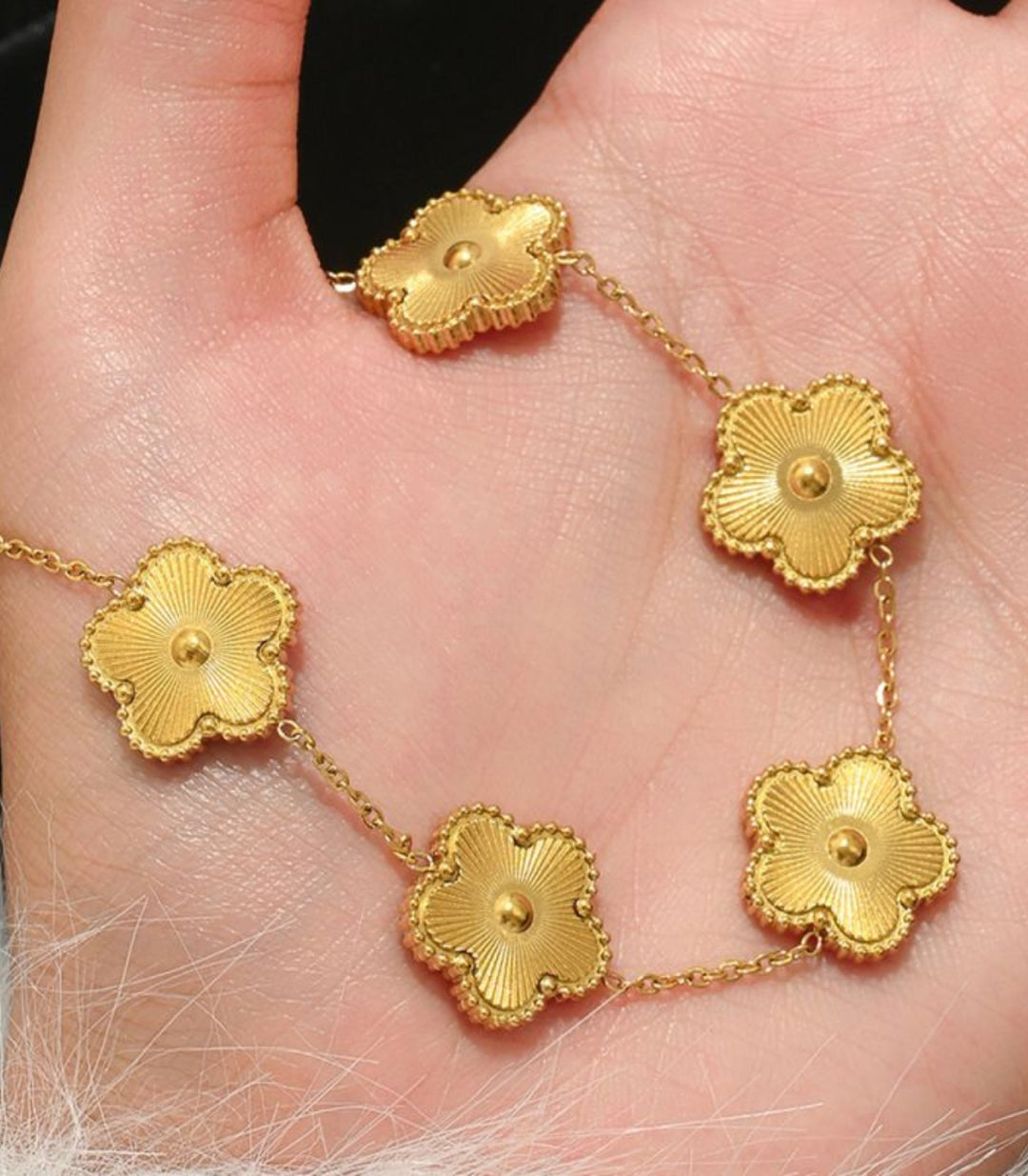 Brazalete flor dorado