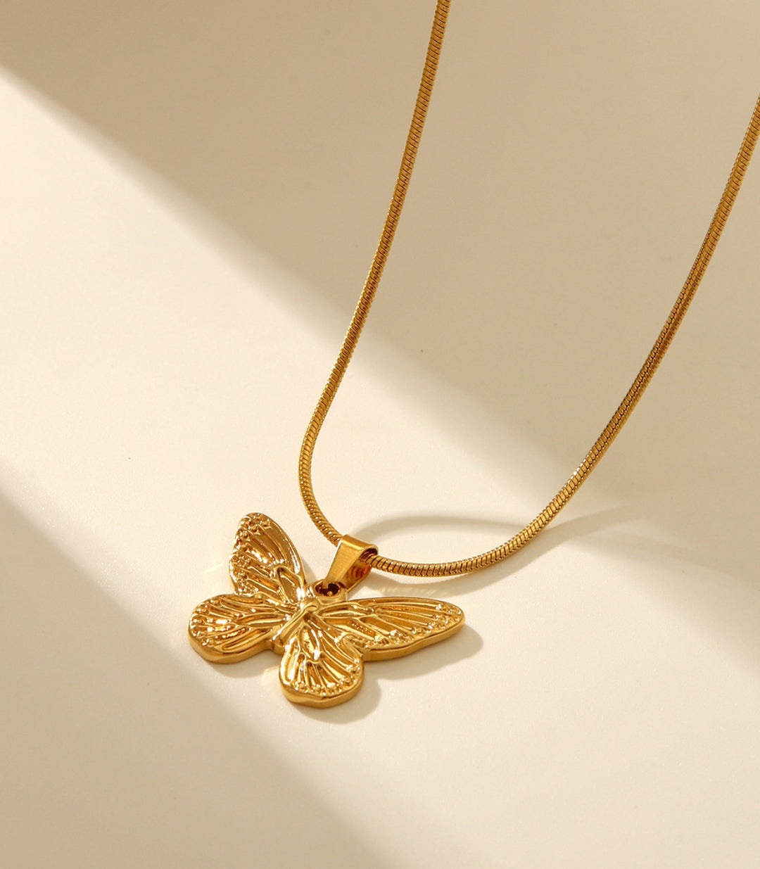 Collar mariposa