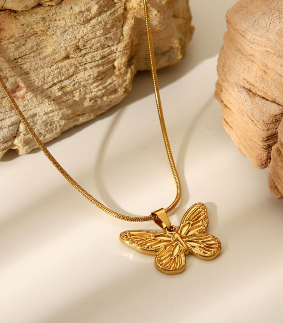 Collar mariposa