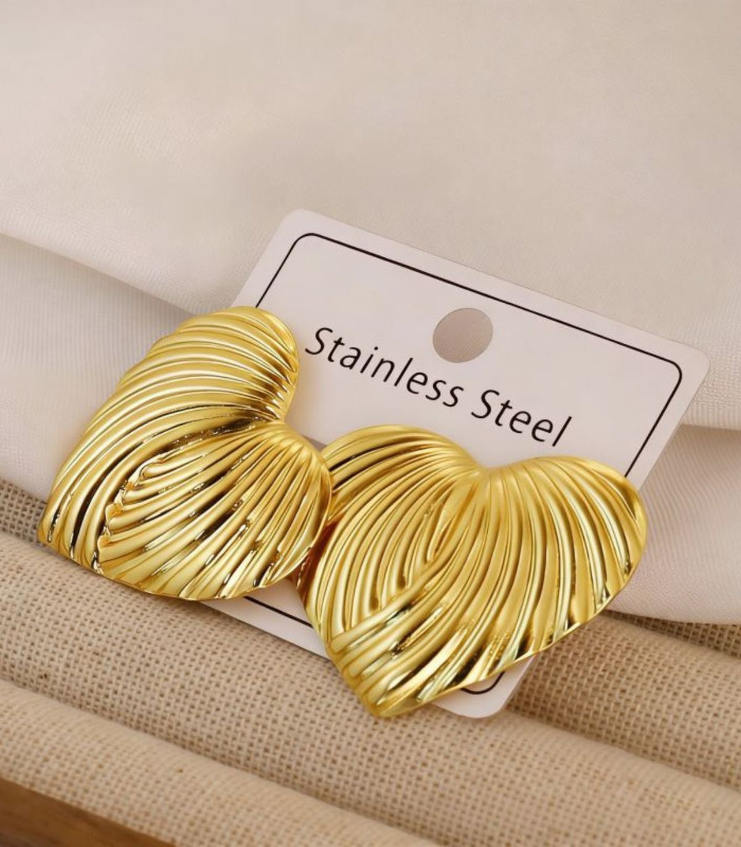 Aretes heard shaped