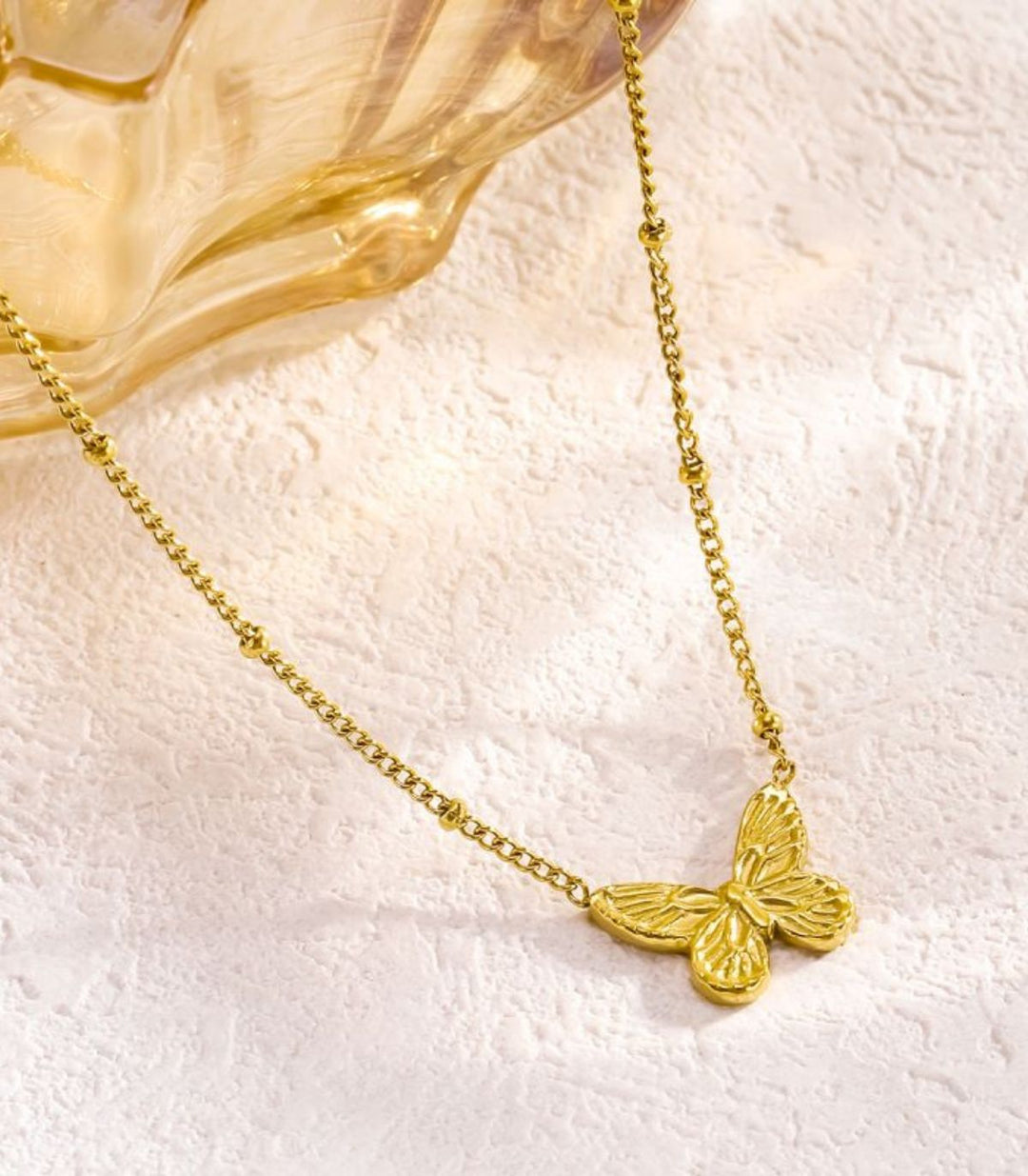 Collar mariposa