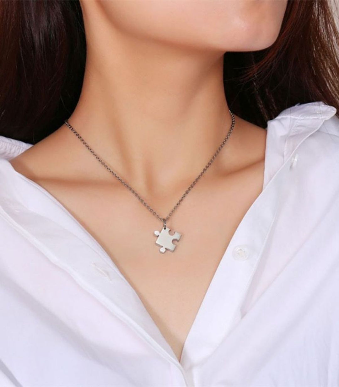 Collar doble corazón rompecabezas