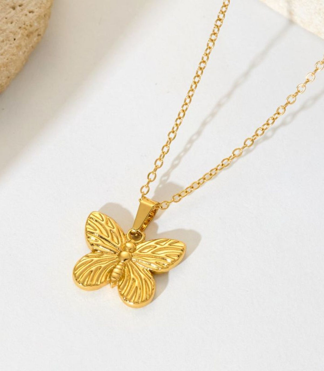 Collar mariposa