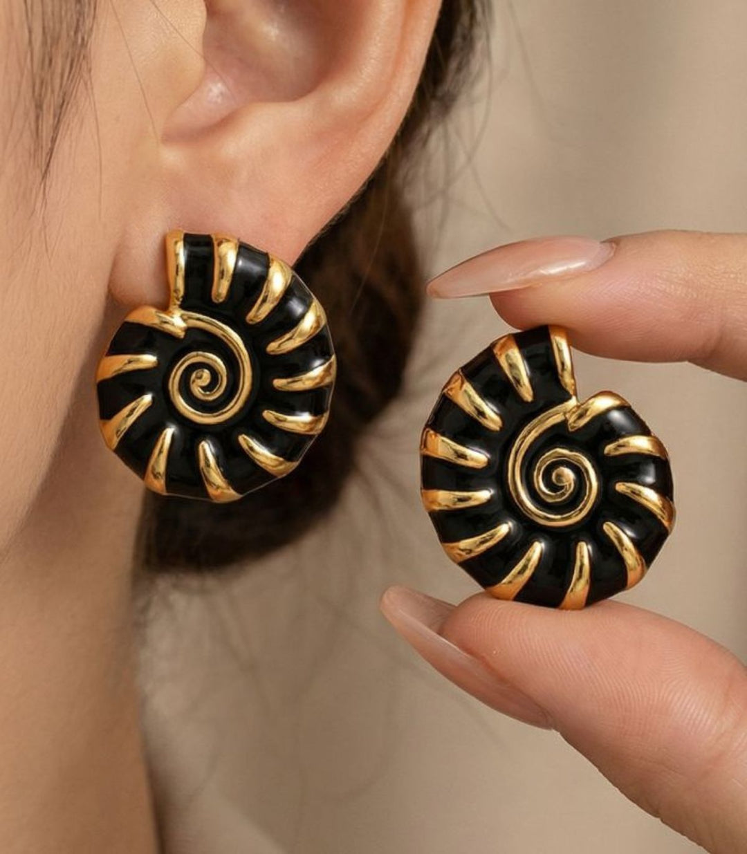 Aretes negros concha