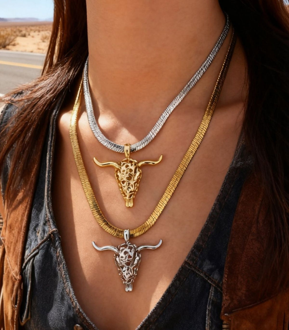 Collar g bull's head snake bone