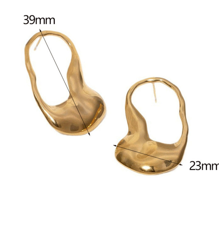 Aretes dorados maxi irregular